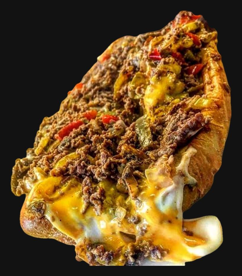 A Deezy's cheesesteak piled with chopped steak, peppers and melted cheese